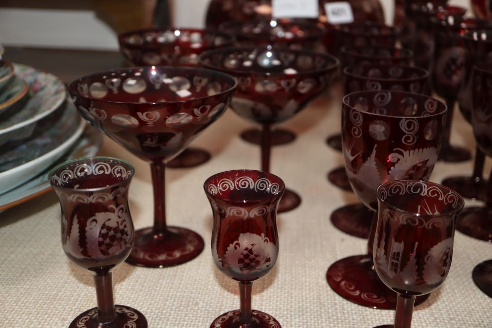 A quantity of cranberry glassware